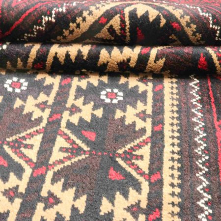 Hand-knotted Persian Baluch carpet