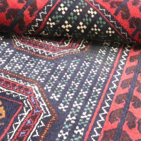 Hand-knotted Persian Baluch carpet