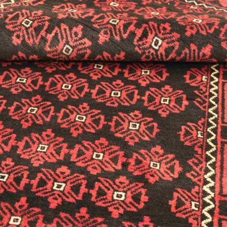 Tapis persan Baluch noué à la main