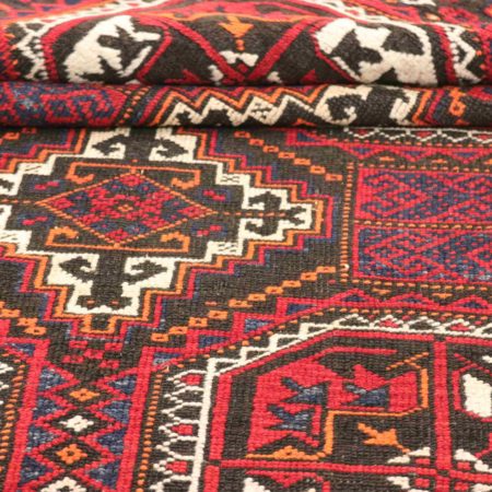 Hand-knotted Persian Baluch carpet