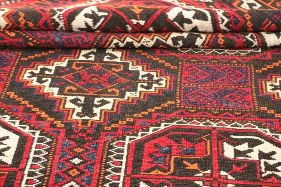 Hand-knotted Persian Baluch carpet