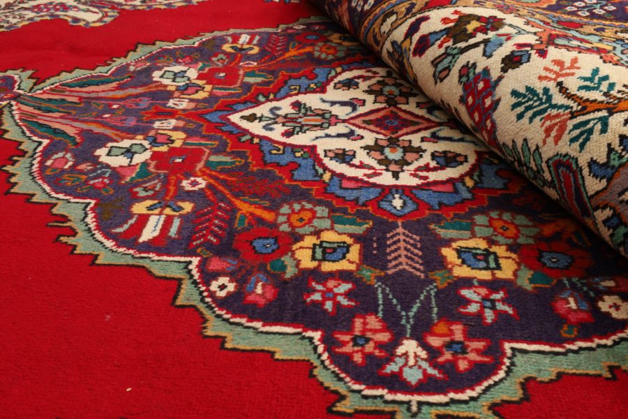 Hand-knotted Persian Mashad carpet