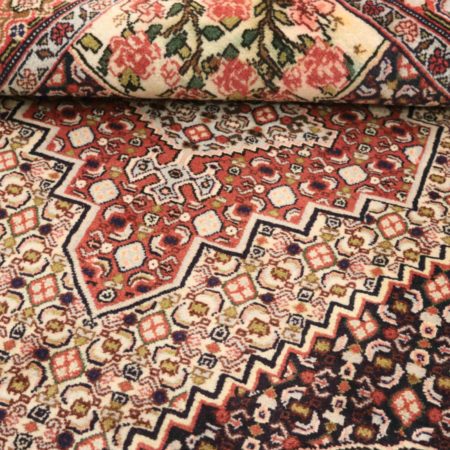 Hand-knotted Persian Senneh carpet